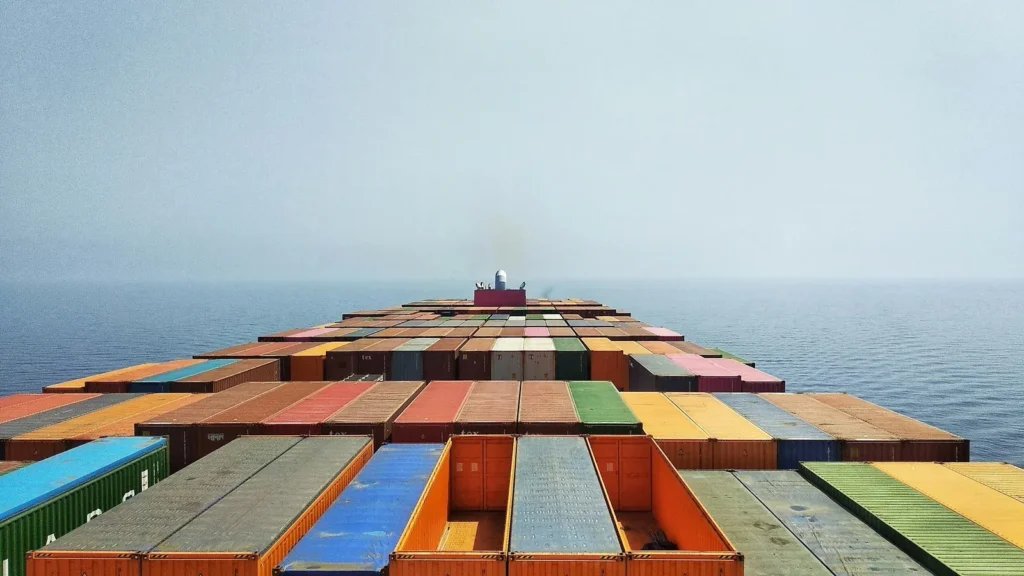 View along the container deck of a ship at sea